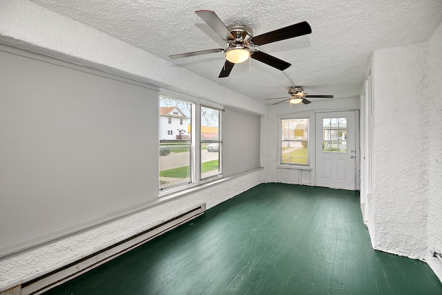 152 S Greenwood Ave, Kankakee, IL 60901 - unfurnished sunroom featuring baseboard heating
