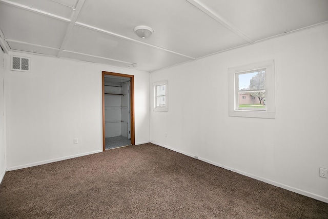 152 S Greenwood Ave, Kankakee, IL 60901 - unfurnished room with dark carpet and baseboards