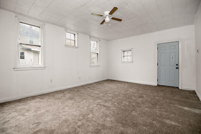 152 S Greenwood Ave, Kankakee, IL 60901 - carpeted empty room featuring a ceiling fan and baseboards