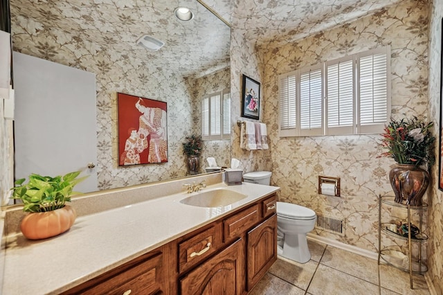 1251 Country Ln, Deerfield, IL 60015 - bathroom with toilet, vanity, and tile patterned flooring