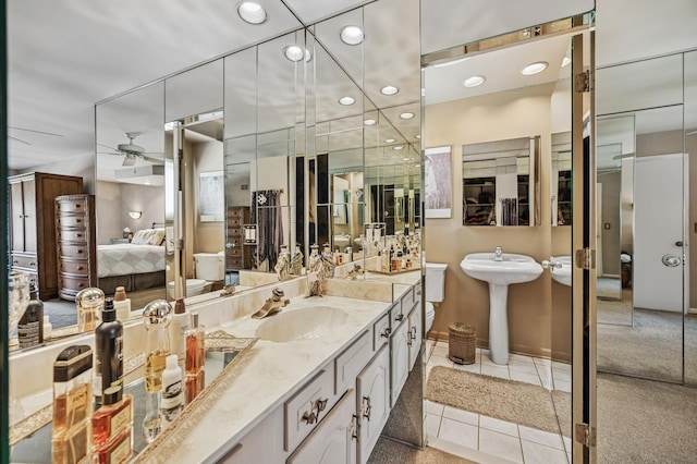 1251 Country Ln, Deerfield, IL 60015 - ensuite bathroom with a sink, ceiling fan, tile patterned floors, and recessed lighting