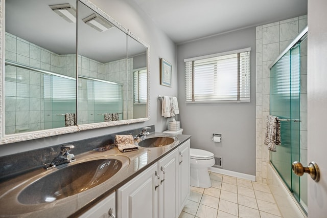 1251 Country Ln, Deerfield, IL 60015 - full bathroom featuring tile patterned flooring, toilet, double vanity, baseboards, and tiled shower / bath