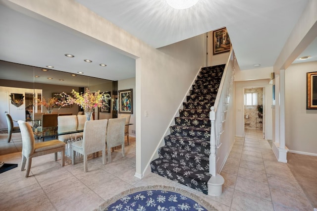 1251 Country Ln, Deerfield, IL 60015 - stairway with tile patterned floors, baseboards, and recessed lighting