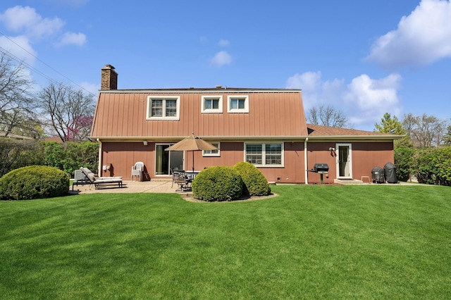 1251 Country Ln, Deerfield, IL 60015 - back of house featuring a chimney, a lawn, and a patio