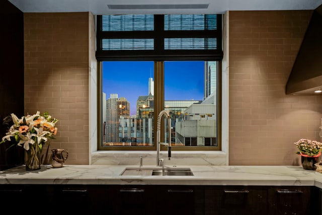 bar with a sink and a skyline view