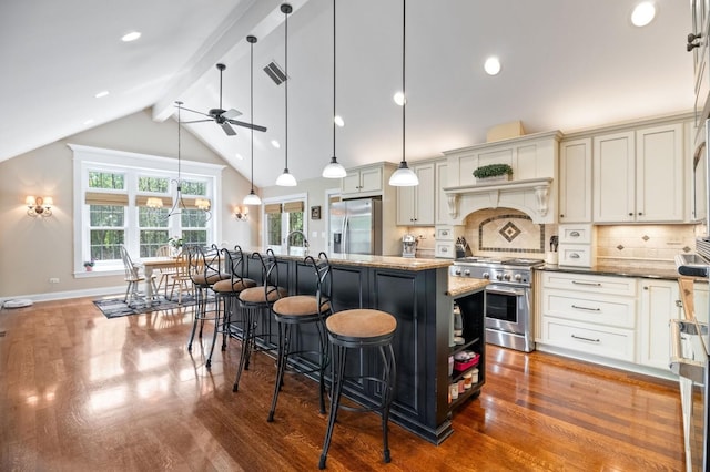 1527 Steeplechase Ct, Green Oaks, IL 60048 - kitchen featuring stainless steel appliances, a ceiling fan, wood finished floors, a kitchen breakfast bar, and a kitchen island with sink