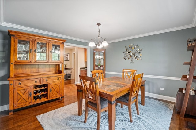1527 Steeplechase Ct, Green Oaks, IL 60048 - dining area with a chandelier, dark wood-style floors, ornamental molding, and baseboards