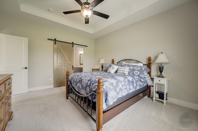 570 Sudbury Cir, Oswego, IL 60543 - bedroom featuring a barn door, light colored carpet, a raised ceiling, and crown molding