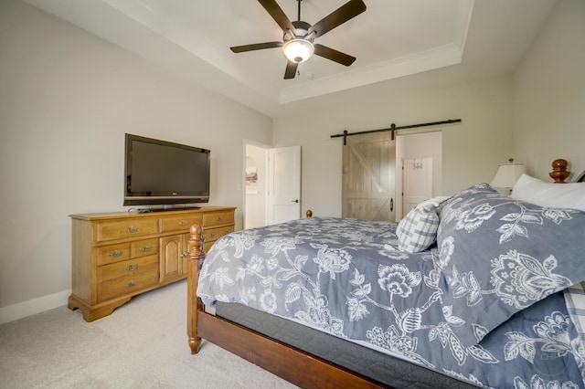 570 Sudbury Cir, Oswego, IL 60543 - bedroom featuring a raised ceiling, light colored carpet, a barn door, a ceiling fan, and crown molding