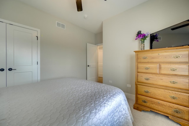 570 Sudbury Cir, Oswego, IL 60543 - carpeted bedroom with a ceiling fan, baseboards, and a closet