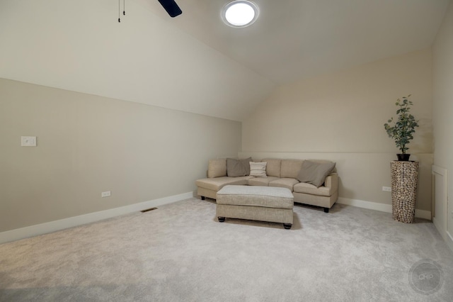 570 Sudbury Cir, Oswego, IL 60543 - living room featuring lofted ceiling, light carpet, ceiling fan, and baseboards