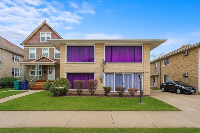 1115 N Harlem Ave Unit 2C, Oak Park, IL 60302 - view of front facade with a front lawn and brick siding
