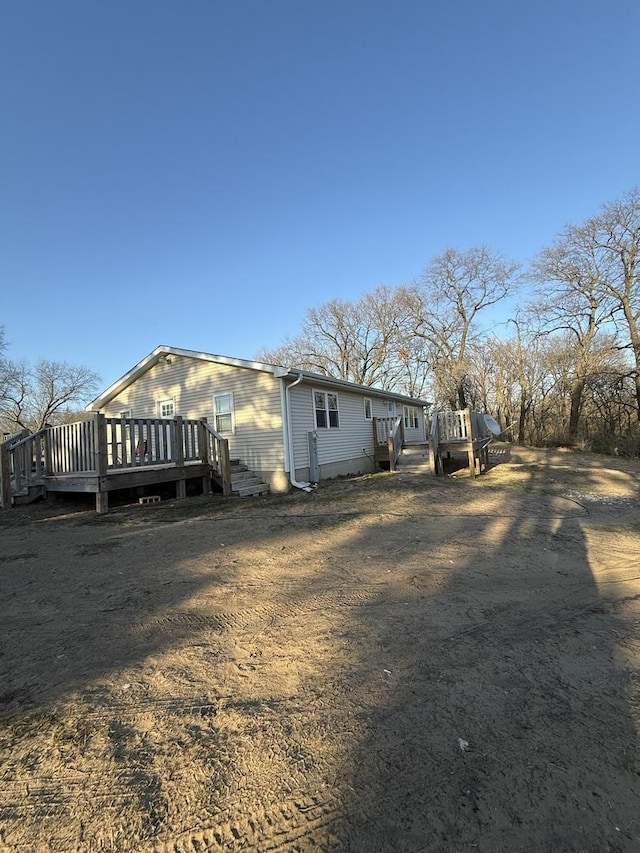 13031 E 6000s Rd, Pembroke Twp, IL 60958 - back of property featuring a deck