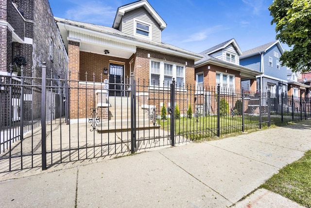 1022 N Lavergne Ave, Chicago, IL 60651 - view of front of property with brick siding and a fenced front yard