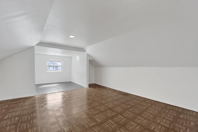 1022 N Lavergne Ave, Chicago, IL 60651 - additional living space with vaulted ceiling, baseboards, and recessed lighting
