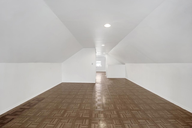 1022 N Lavergne Ave, Chicago, IL 60651 - additional living space with vaulted ceiling, baseboards, and recessed lighting