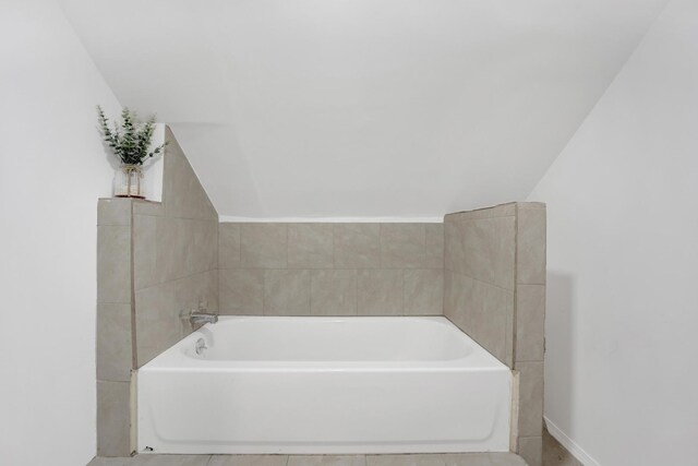 1022 N Lavergne Ave, Chicago, IL 60651 - full bathroom with a garden tub, baseboards, and lofted ceiling