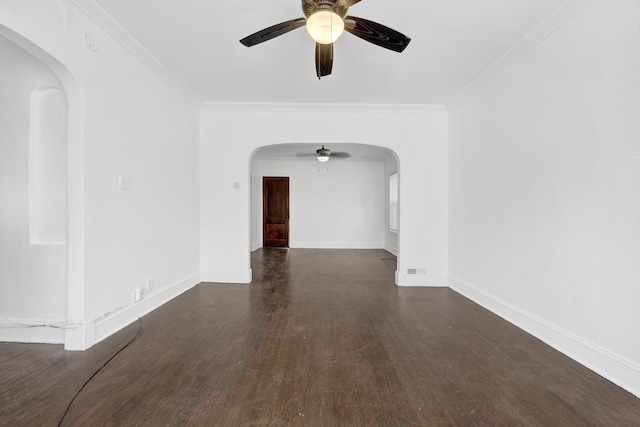 1022 N Lavergne Ave, Chicago, IL 60651 - empty room with ceiling fan, arched walkways, wood finished floors, crown molding, and baseboards