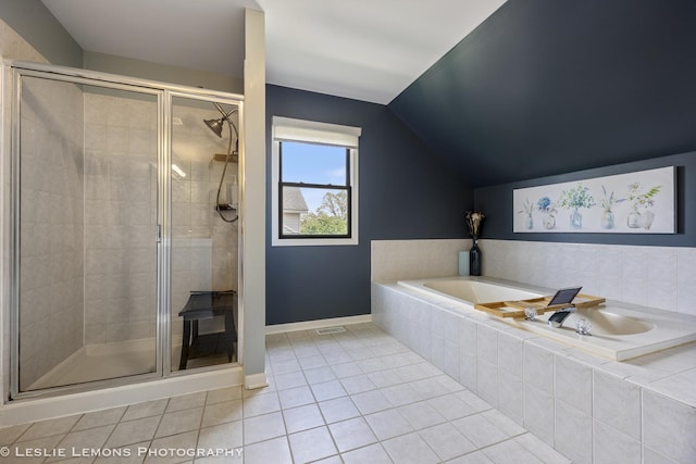 full bath featuring tile patterned flooring, a shower stall, a bath, lofted ceiling, and baseboards