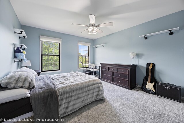 carpeted bedroom featuring a ceiling fan