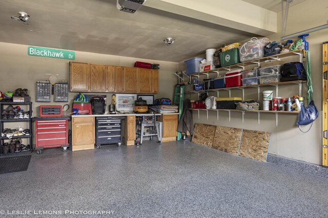 garage featuring a garage door opener