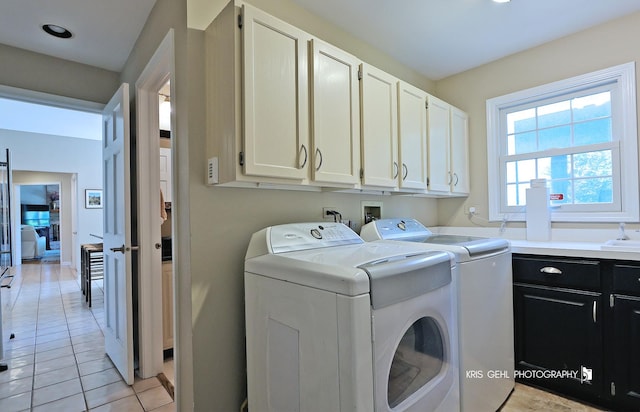 36708 Old Woods Trl, Gurnee, IL 60031 - washroom with cabinet space, independent washer and dryer, and light tile patterned floors