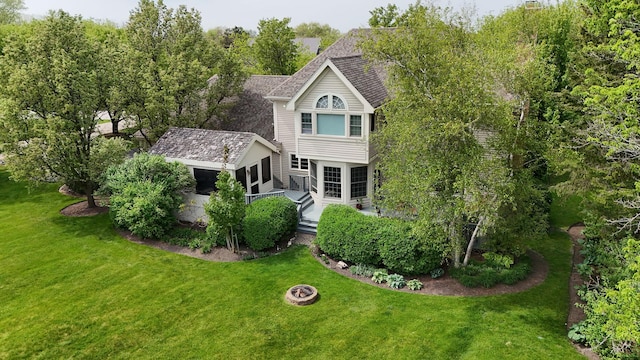 36708 Old Woods Trl, Gurnee, IL 60031 - view of front of home featuring a front lawn, a shingled roof, and a wooden deck
