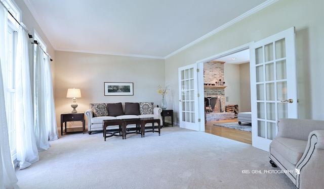 36708 Old Woods Trl, Gurnee, IL 60031 - living area featuring french doors, carpet floors, ornamental molding, and a brick fireplace