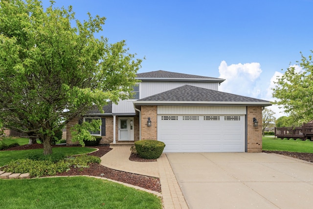 15540 Frances Ln, Orland Park, IL 60462 - traditional-style house featuring a garage, concrete driveway, brick siding, and roof with shingles