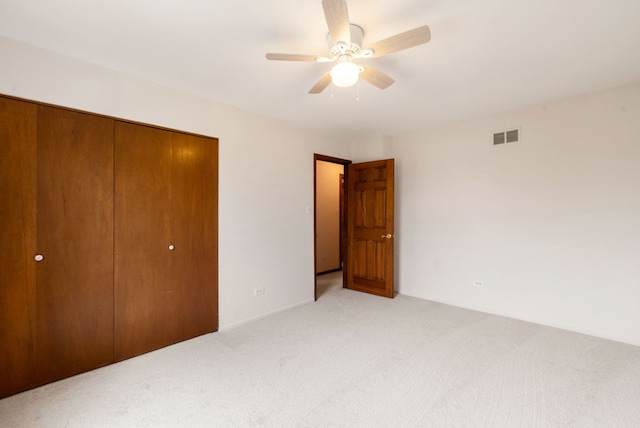 15540 Frances Ln, Orland Park, IL 60462 - unfurnished bedroom with light colored carpet, a closet, and ceiling fan