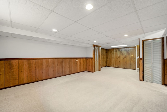 15540 Frances Ln, Orland Park, IL 60462 - finished below grade area featuring wooden walls, carpet floors, a drop ceiling, wainscoting, and recessed lighting