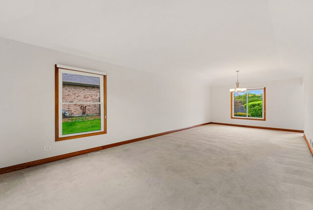 15540 Frances Ln, Orland Park, IL 60462 - carpeted empty room featuring a chandelier and baseboards
