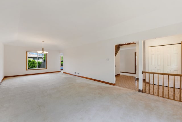 15540 Frances Ln, Orland Park, IL 60462 - empty room with carpet floors, a chandelier, and baseboards
