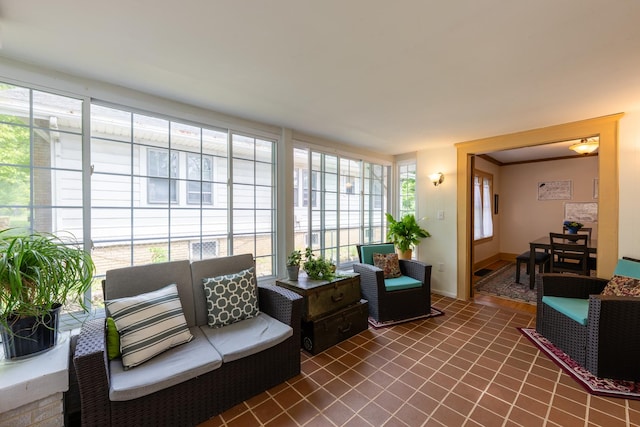 1521 W University Ave, Champaign, IL 61821 - sunroom featuring baseboards