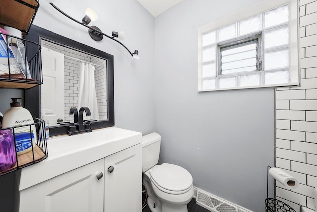 14821 Cooper Ave, Harvey, IL 60426 - bathroom featuring toilet and vanity