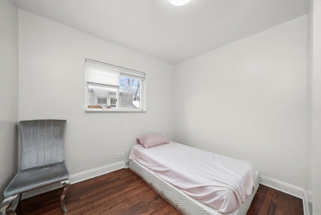14821 Cooper Ave, Harvey, IL 60426 - bedroom featuring baseboards and wood finished floors