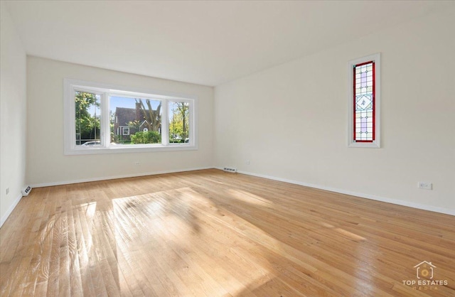 919 Santa Rosa Ave, Wheaton, IL 60187 - spare room with baseboards and light wood-type flooring