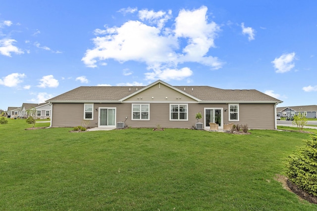 1187 Sonoma Ct, Pingree Grove, IL 60140 - rear view of house with central AC unit, a lawn, and a patio area