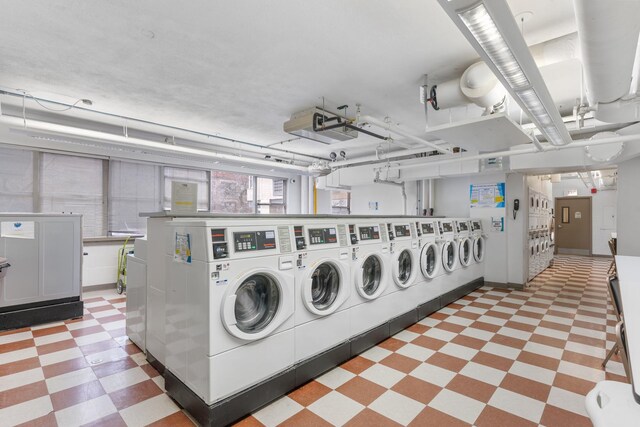 6301 N Sheridan Rd Unit 11D, Chicago, IL 60660 - shared laundry room featuring light flooring and washer and clothes dryer