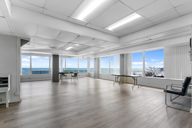 6301 N Sheridan Rd Unit 11D, Chicago, IL 60660 - miscellaneous room featuring a water view, wood finished floors, and a paneled ceiling