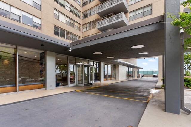 6301 N Sheridan Rd Unit 11D, Chicago, IL 60660 - view of exterior entry featuring uncovered parking
