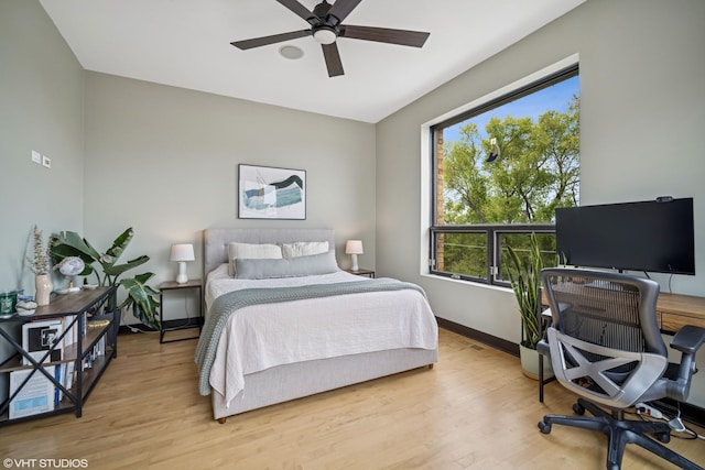 2130 W N Ave Unit 208, Chicago, IL 60647 - bedroom featuring light wood finished floors, an office area, baseboards, and a ceiling fan