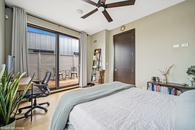 2130 W N Ave Unit 208, Chicago, IL 60647 - bedroom with light wood finished floors, access to exterior, an office area, and a ceiling fan
