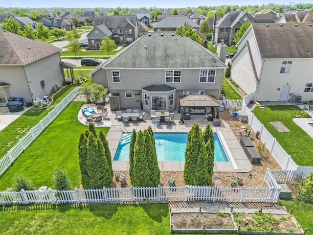 view of pool featuring a gazebo, a patio, a residential view, and outdoor dining space