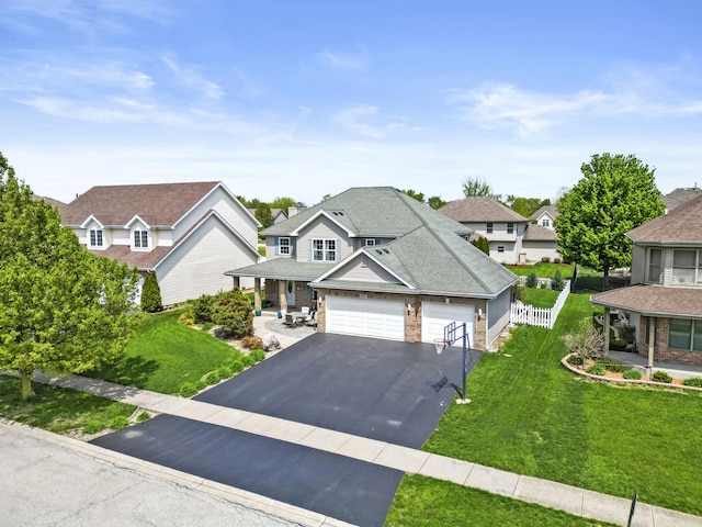 view of front facade featuring driveway, a residential view, a porch, and roof with shingles