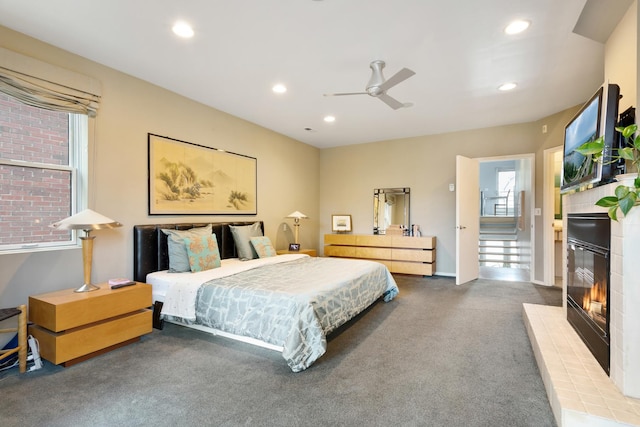 1805 N Paulina St, Chicago, IL 60622 - carpeted bedroom with a glass covered fireplace, recessed lighting, and ceiling fan