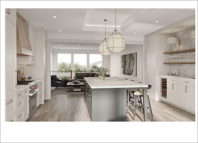 2659 W Medill Ave, Chicago, IL 60647 - kitchen featuring stainless steel stove, custom range hood, open shelves, light wood-type flooring, and a kitchen island