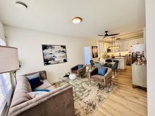 619 N Homan Ave, Chicago, IL 60624 - living room with light wood finished floors and ceiling fan