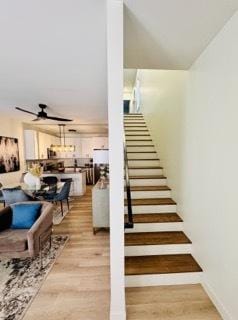 619 N Homan Ave, Chicago, IL 60624 - stairs featuring ceiling fan and wood finished floors