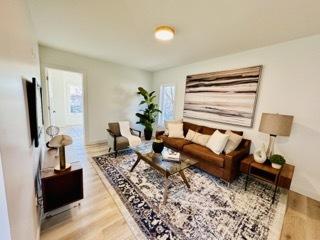 619 N Homan Ave, Chicago, IL 60624 - living room with wood finished floors